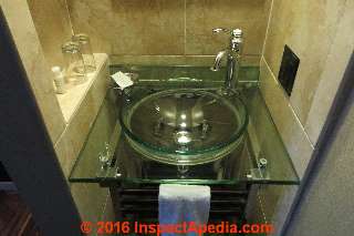 Glass bath lav sink, Mansfield Hotel, New York City (C) Daniel Friedman InspectAPedia.com