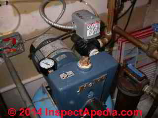 Water pressure gauge mounted directly on a water pump (C) Daniel Friedman