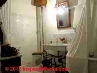 Wall Tank flush toilet (C) D Friedman