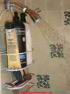 Shower head change required for good hot water flow from a swap-in of a new tankless or instant water heater unit (C) Daniel Friedman
