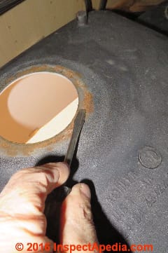 Cast iron bottom of a Kohler porcelain enameled kitchen sink (C) InspectApedia.com Daniel Friedman