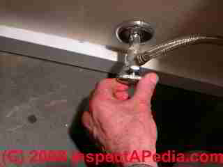 Toilet water supply valve (C) Daniel Friedman
