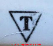 T inside of a Triangle appears as a brand on this Porcelain toilet from the 1940s, installed in California (C) InspectApedia.com JM