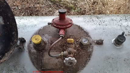 LP tank gas regulator installed at a home in Two Harbors Minnesota (C) Daniel Friedman at InspectApedia.com