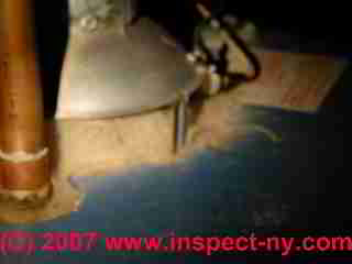 Photograph of a flue gas spill at a water heater