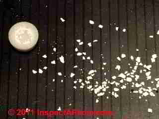 White debris particles found in water supply (C) Daniel Friedman