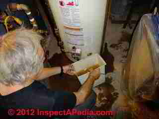 Removing debris that clogged a water heater outlet and plumbing faucets (C) D Friedman R Arlyck