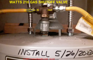 Watts 210 automatic gas shutoff valve installed on a water heater (C) InspectApedia.com Walker