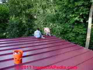 Metal roof installation © D Friedman at InspectApedia.com 