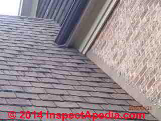 Asphalt roof single tab sealant bleed-out staining on a Maryland roof © InspectApedia Bob Sissons