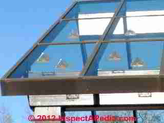 Adhesive bonded snow guards on glass roof Rhinebeck NY (C) Daniel Friedman