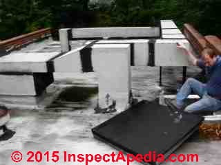 Low slope roof inspection (C) Daniel Friedman