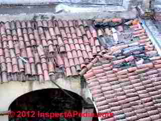 Clay tile roof with extensive damage (C) D Friedman