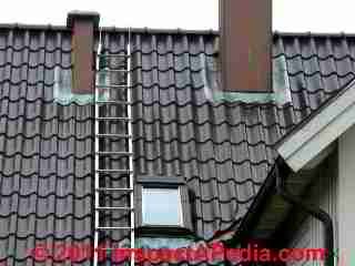 Photograph of  really worn out asphalt roof shingles