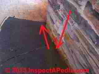 Red roof stains traced to chimney (C) InspectApedia