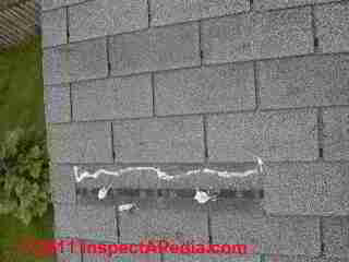 Horizontal crack split asphalt shingles (C) Daniel Friedman