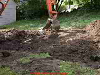 Photograph of backfilling the sewer line trench