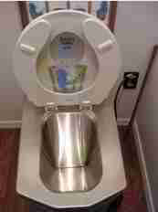 Photo of an incinerating toilet - the Incinolet incinerting toilet from Incinolet.com
