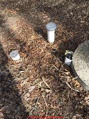 Septic tank cover and plastic riser for pump wiring, possibly unsafe (C) InspectAPeida.com 