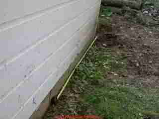 PHOTO of how to record measurements to locate the septic tank cleanout cover.