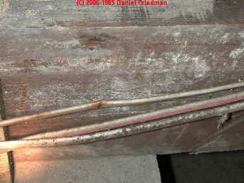 moldy framing exposed in living space