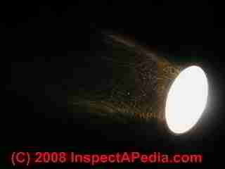 Airborne dust shown by flashlight (C) Daniel Friedman