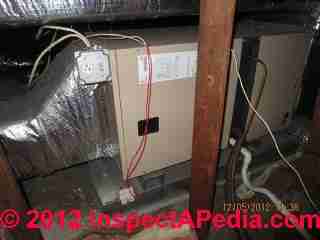 Vermiculite & asbestos dust contamination in a buildnig (C) InspectApedia.com & David Grudzinski