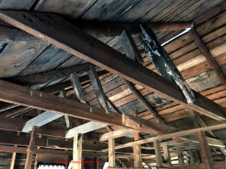 Truss roof in a  120 year old cabin (C) InspectApedia.com