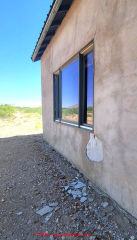 Portal, AZ straw bale house with some defects showing (C) InspectApedia.com PKZ