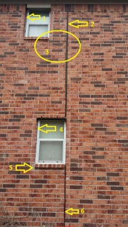 Comments on damaged brick veneer wall (C) InspectApedia.com Daniel Friedman