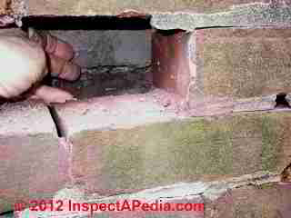 Structural brick wall with rain screen opening between wythes © D Friedman at InspectApedia.com 