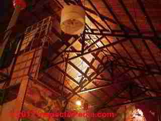 Photograph of  severe roof structure damage from an unattended roof valley leak in a historic home.