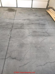 multiple concrete cracks in new garage floor (C) InspectApedia.com JL