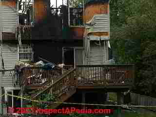 Fire damaged vinyl siding (C) Daniel Friedman