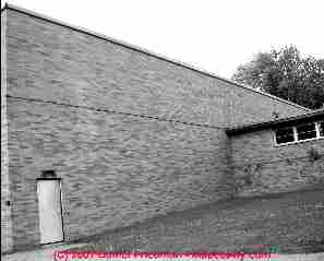 Photograph of thermal expansion damage to a brick wall