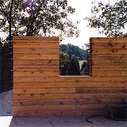 Log wall being framed © Daniel Friedman at InspectApedia.com