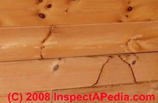 Leak stains inside a log home © Daniel Friedman at InspectApedia.com