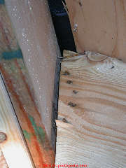 Toe-nailed rafter separating at ridge board © Daniel Friedman at InspectApedia.com