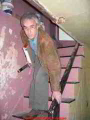 Photograph of a stair railing that is no use against falling.