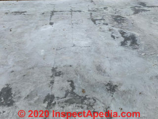 Discoloration & cracks in new slab poured in Texas on hot day (C) InspectApedia.com EricDoty
