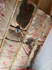 Moldy insulation due to inadequately-vented roof (C) InspectApedia.com DanK