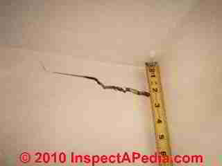 Sinking house cracks (C) Daniel Friedman