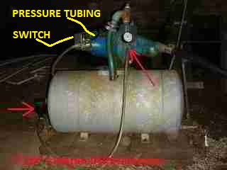 Photograph of a water pressure tank air volume control