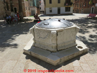 Dug well solid steel cover in Venice, Italy (C) Daniel Friedman at InspectApedia.com