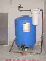 Water pressure tank, submersible pump (C) InspectApedia