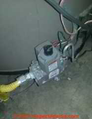 Buzzing noise at gas fired water heater (C) InspectApedia.com RS