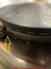 Thin wire added at gas burner igniter (C) InspectApedia.com Shlig