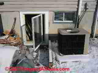 Flood damage debris tossed out the window (C) Daniel Friedman
