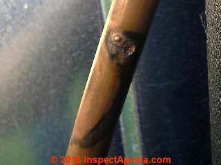 Electrical Arc damaged copper refrigerant line (C) Daniel Friedman