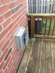 Gas fireplace sidewall vent over deck distance to hot tub (C) InspectApedia.com Bev